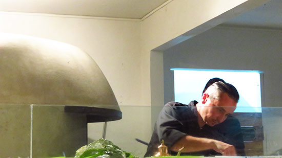 chef juergen preparing pizzas